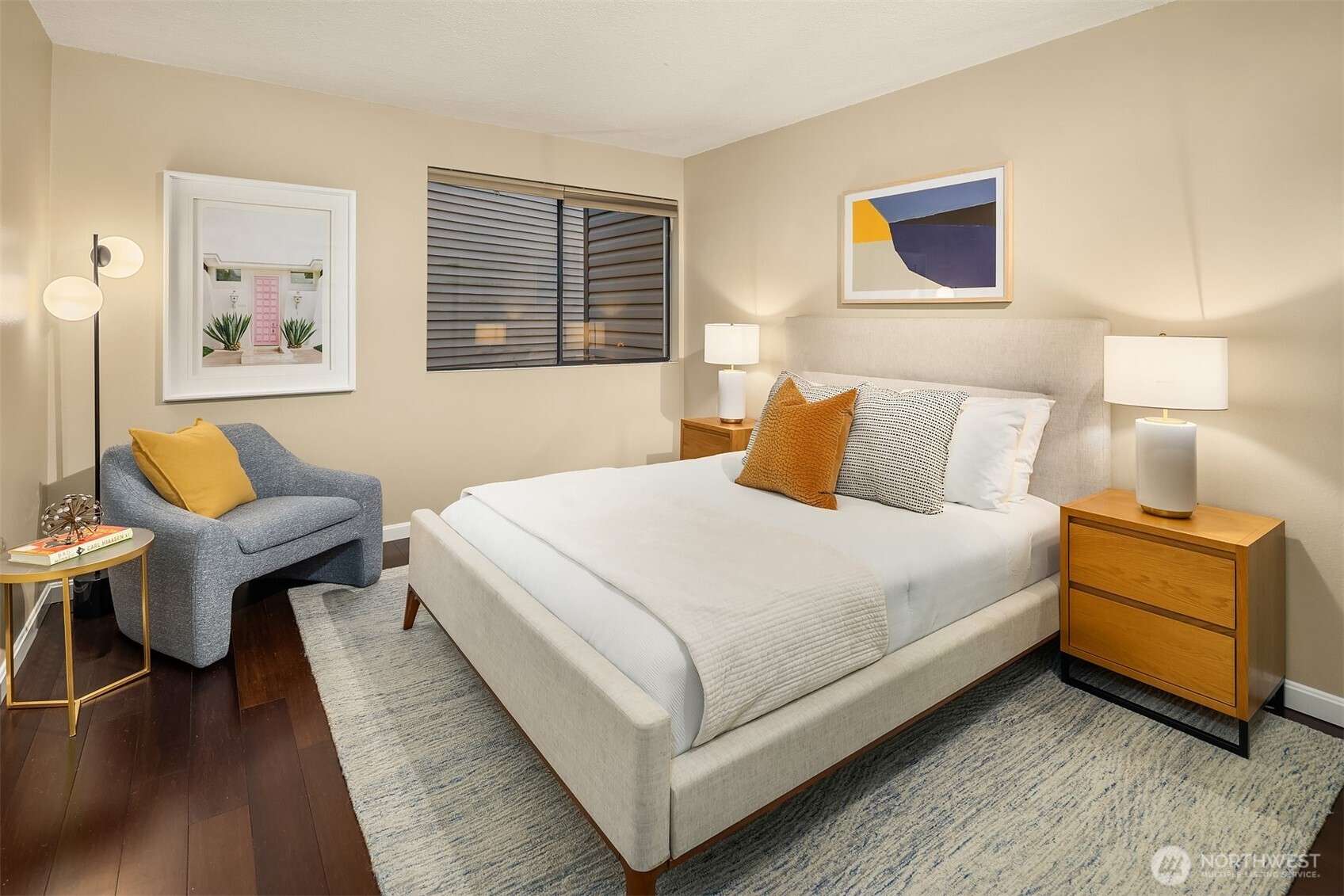 3608 26th Place West, Unit 201 Seattle, WA 98199 - Photo 14 of 33 a bedroom with a bed and a couch