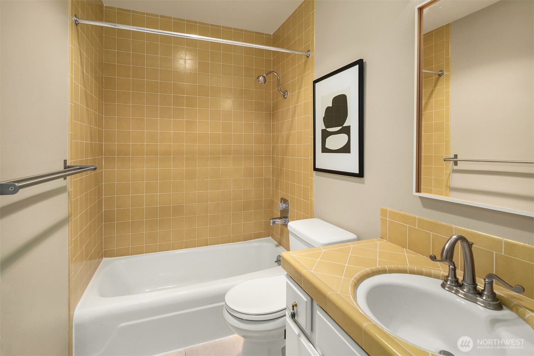 3608 26th Place West, Unit 201 Seattle, WA 98199 - Photo 17 of 33 a bathroom with a sink toilet and shower