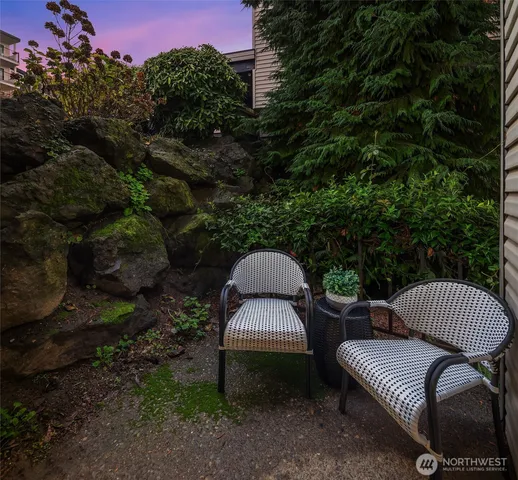 a view of a patio in the backyard