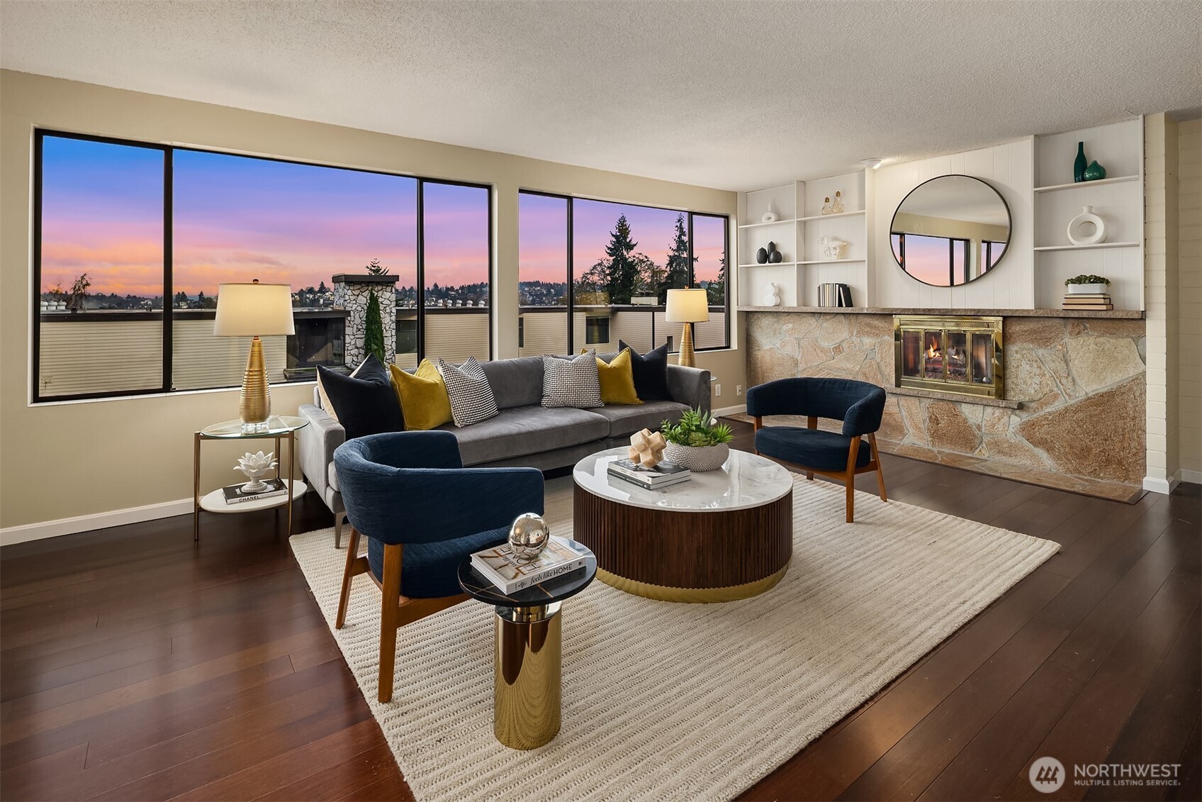 3608 26th Place West, Unit 201 Seattle, WA 98199 - Photo 2 of 33 a living room with furniture and a floor to ceiling window