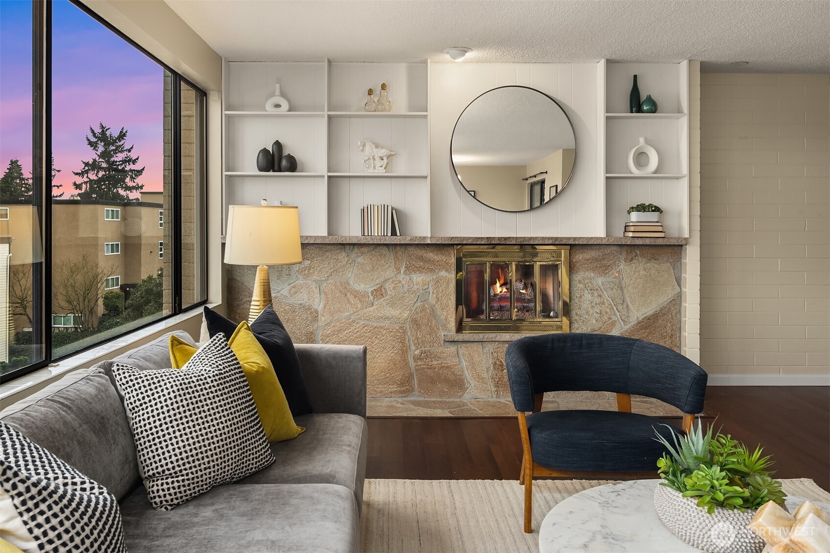 3608 26th Place West, Unit 201 Seattle, WA 98199 - Photo 3 of 33 a living room with furniture and wooden floor