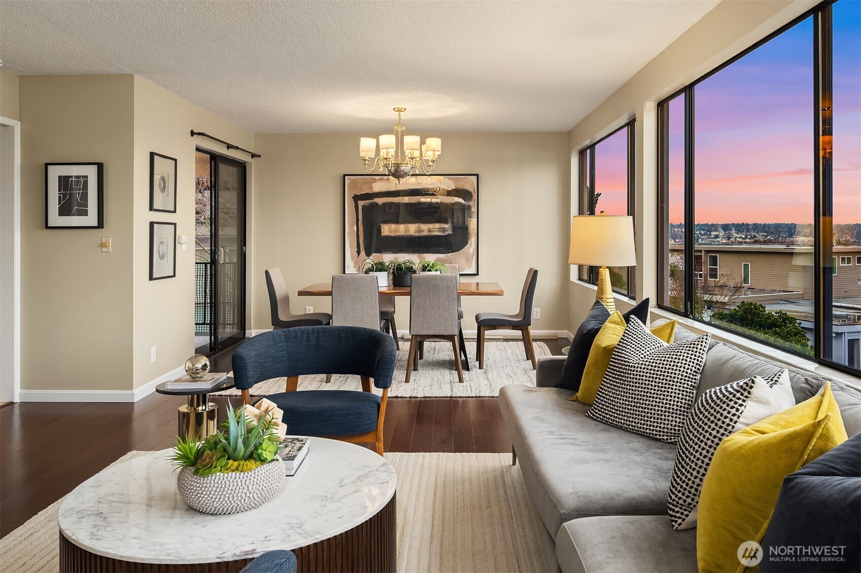 3608 26th Place West, Unit 201 Seattle, WA 98199 - Photo 4 of 33 a living room with furniture and a floor to ceiling window