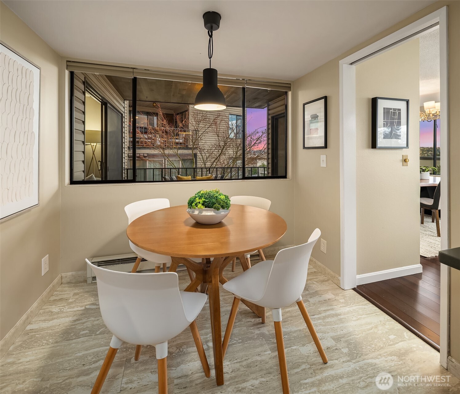 3608 26th Place West, Unit 201 Seattle, WA 98199 - Photo 8 of 33 a dining room with furniture and window