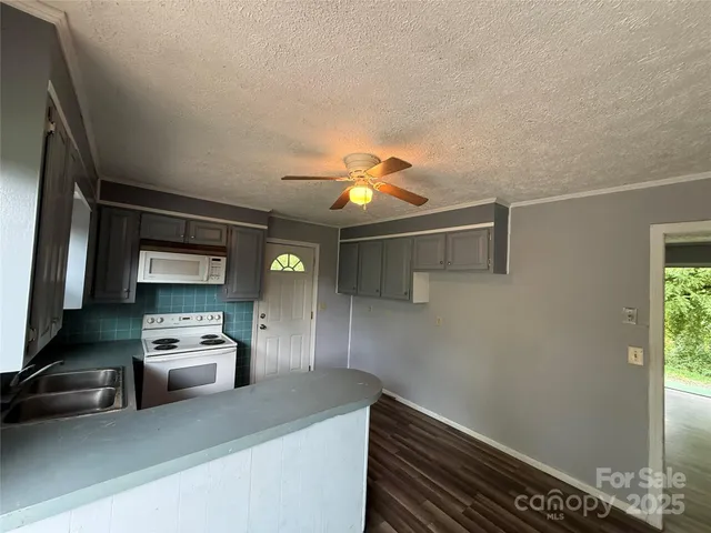 a hallway with a car parked