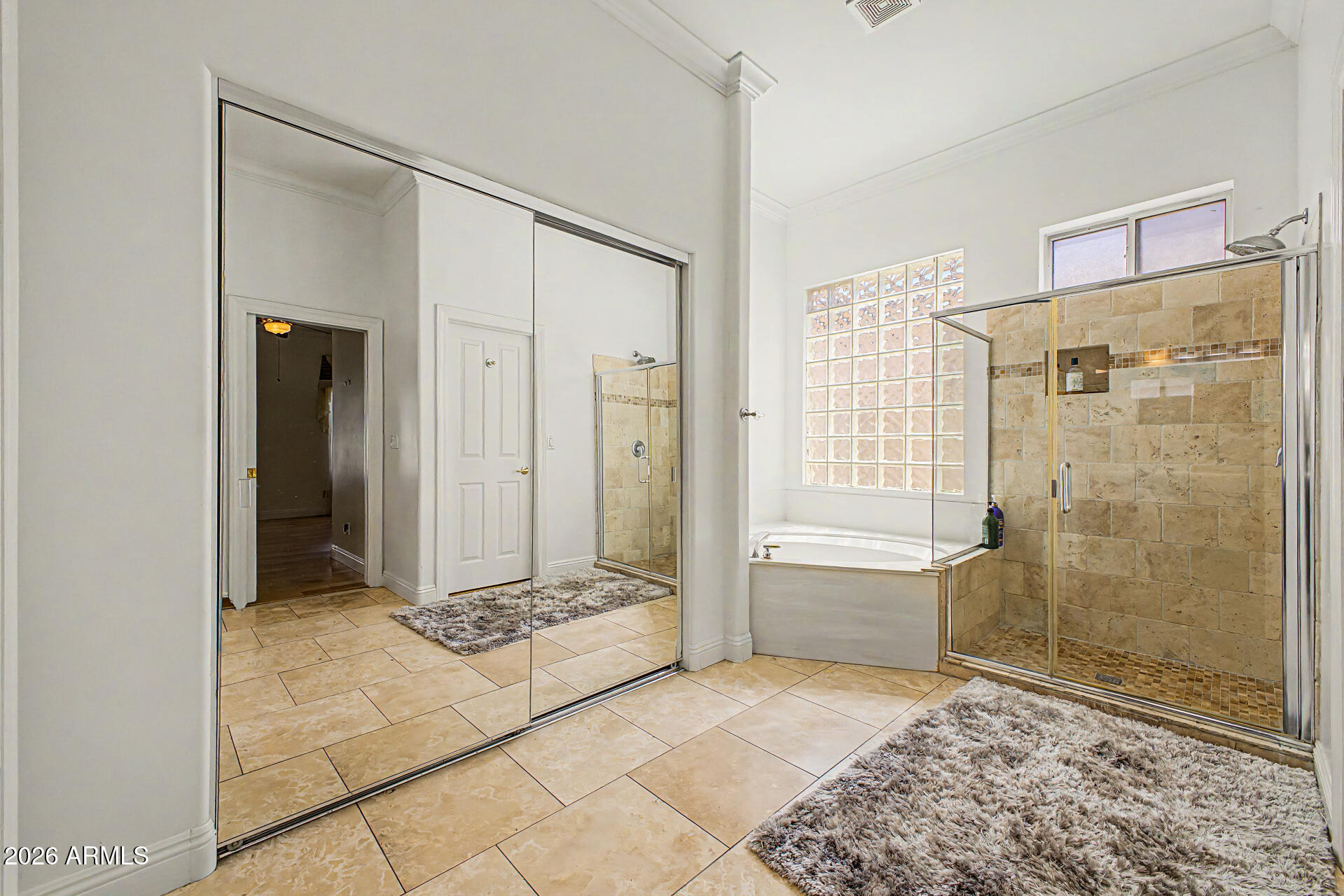 808 West Citrus Way Phoenix, AZ 85013 - Photo 17 of 35 a bathroom with a glass shower door