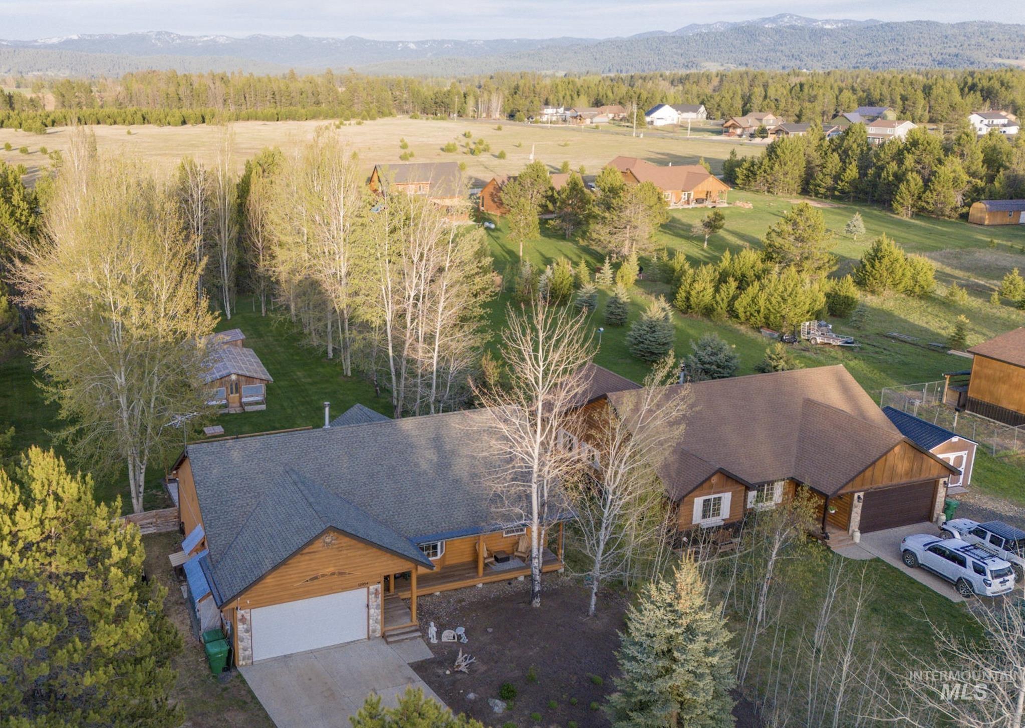 12954 Upland Road Donnelly, ID 83615 - Photo 2 of 41 View from above of property with mountains