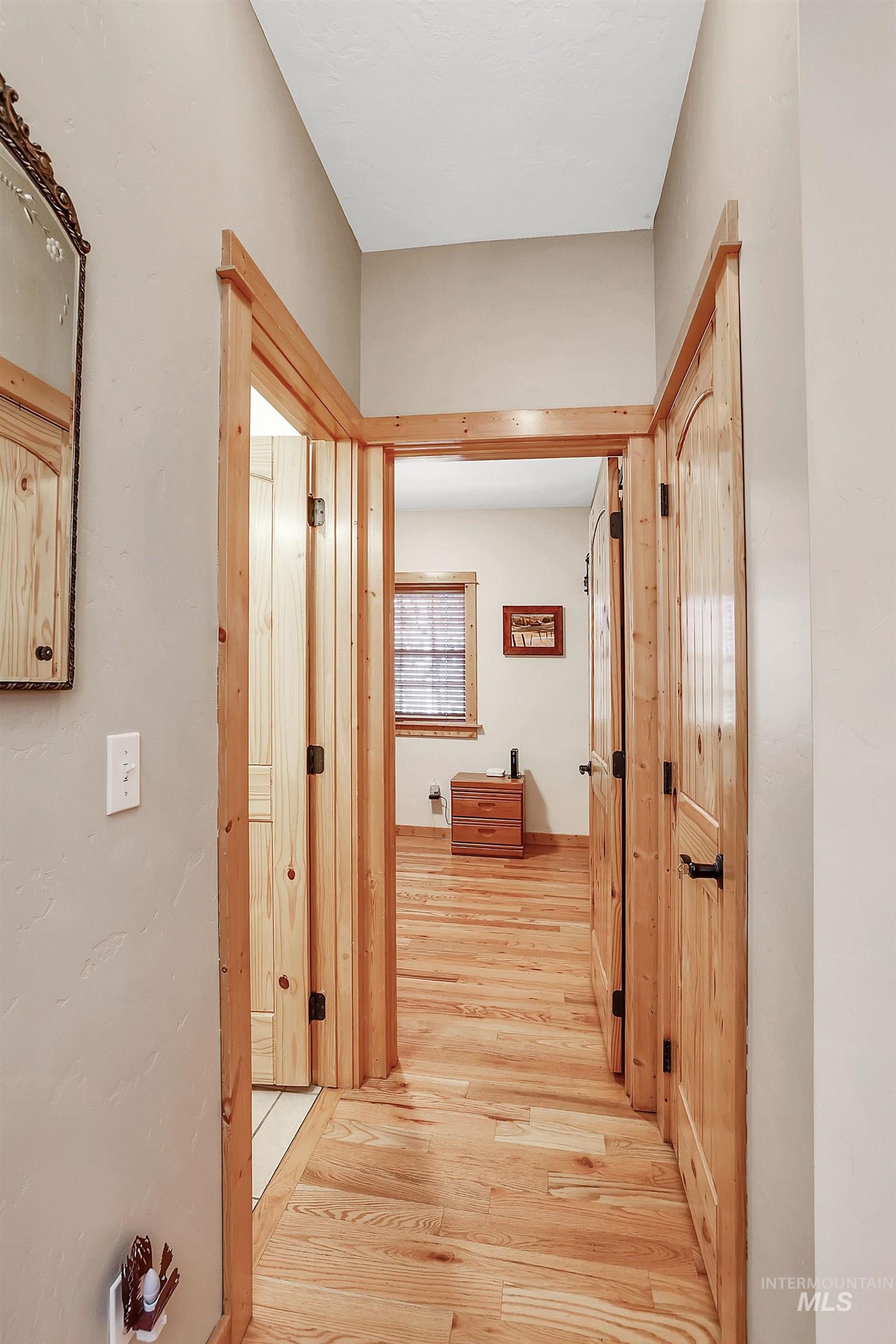12954 Upland Road Donnelly, ID 83615 - Photo 24 of 41 Corridor featuring light wood-type flooring