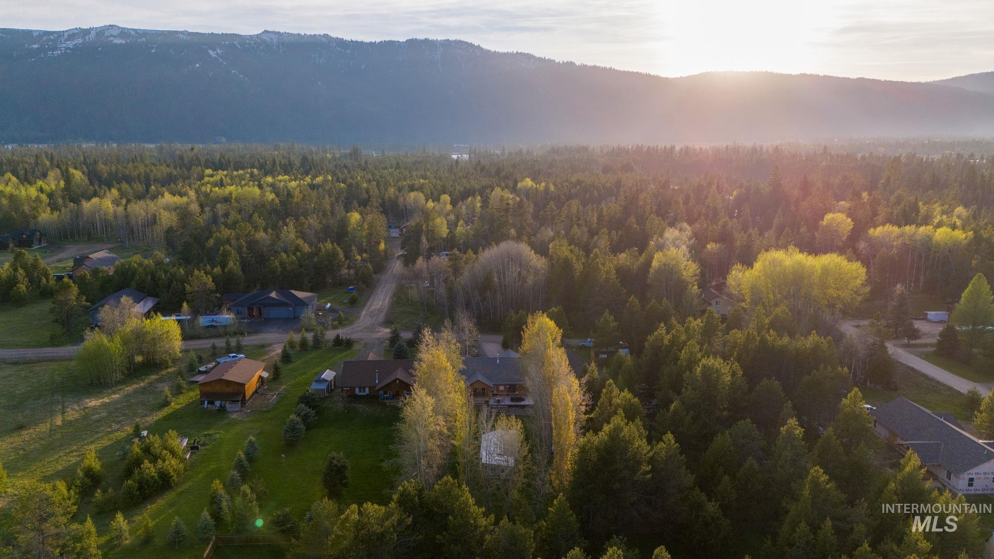 12954 Upland Road Donnelly, ID 83615 - Photo 38 of 41 Bird's eye view of mountains and a forest