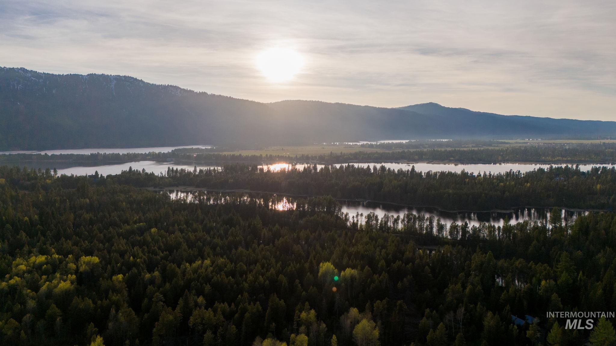 12954 Upland Road Donnelly, ID 83615 - Photo 40 of 41 View of mountain backdrop featuring a nearby body of water