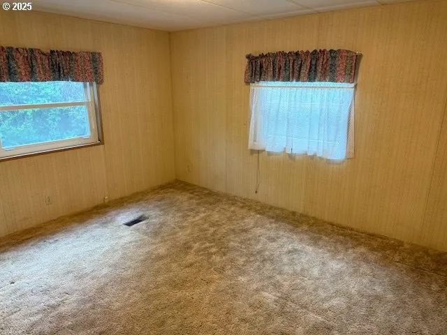 a bathroom with a tub and shower