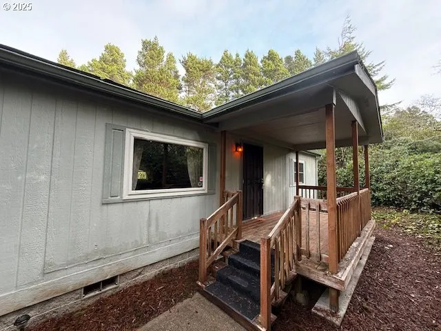 a black and white photo of a house