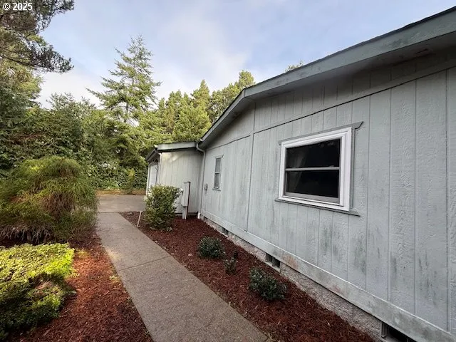 a black and white photo of a house