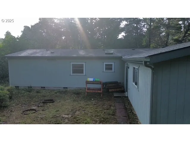 a black and white photo of a house