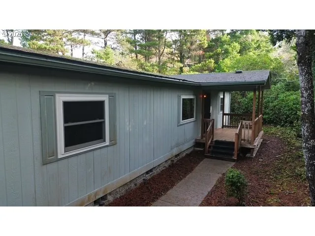 a black and white photo of a house
