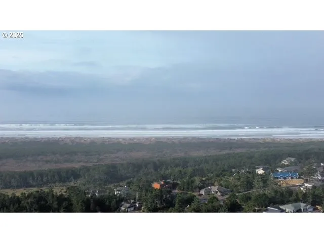 a view of city and mountain in the distance