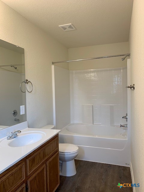 279 Olaf Drive Temple, TX 76504 - Photo 12 of 14 a bathroom with a granite countertop sink a toilet and shower