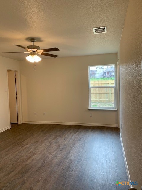 279 Olaf Drive Temple, TX 76504 - Photo 14 of 14 wooden floor in an empty room with a window