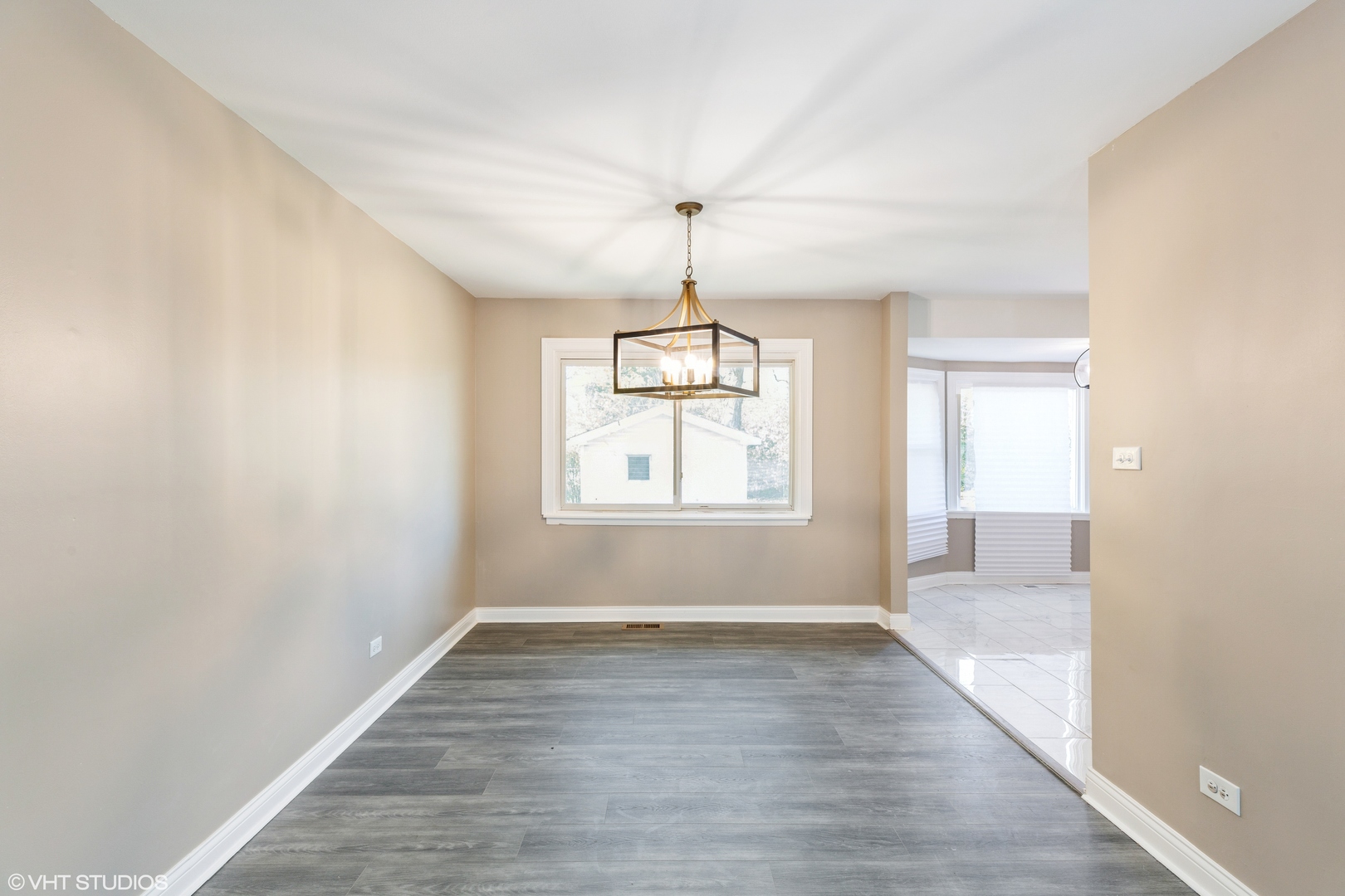 17618 Maple Avenue Country Club Hills, IL 60478 - Photo 6 of 14 wooden floor in an empty room with a window