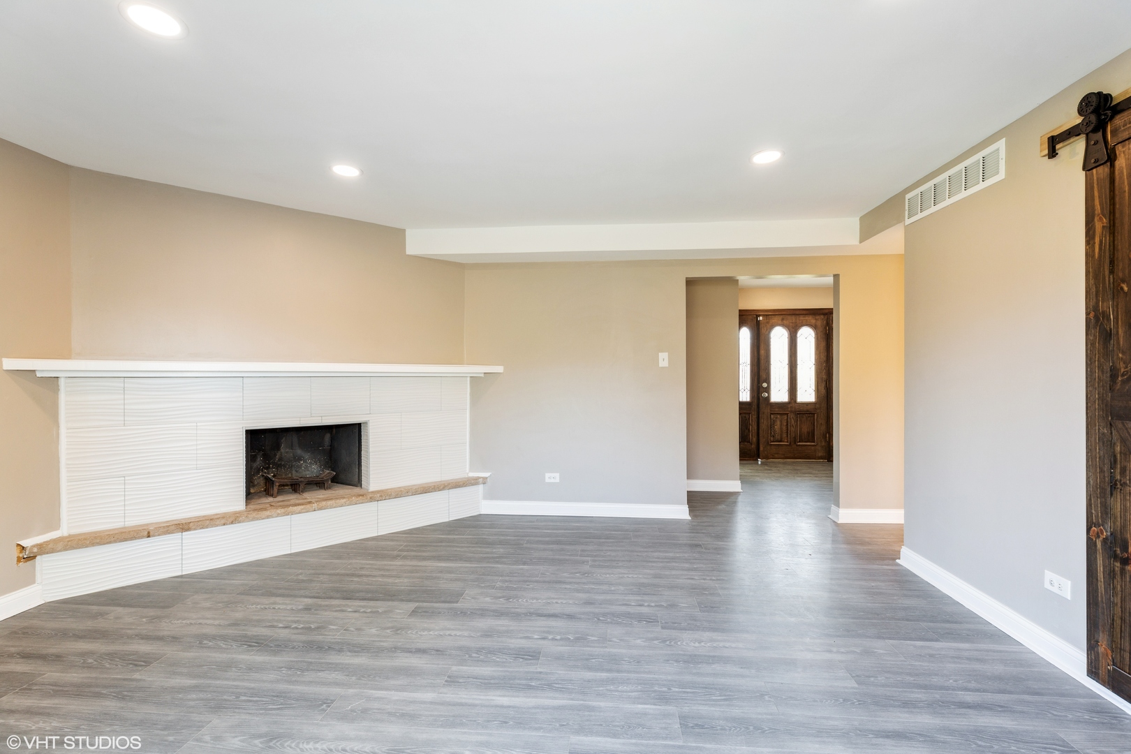 17618 Maple Avenue Country Club Hills, IL 60478 - Photo 9 of 14 a view of an empty room with wooden floor and a window