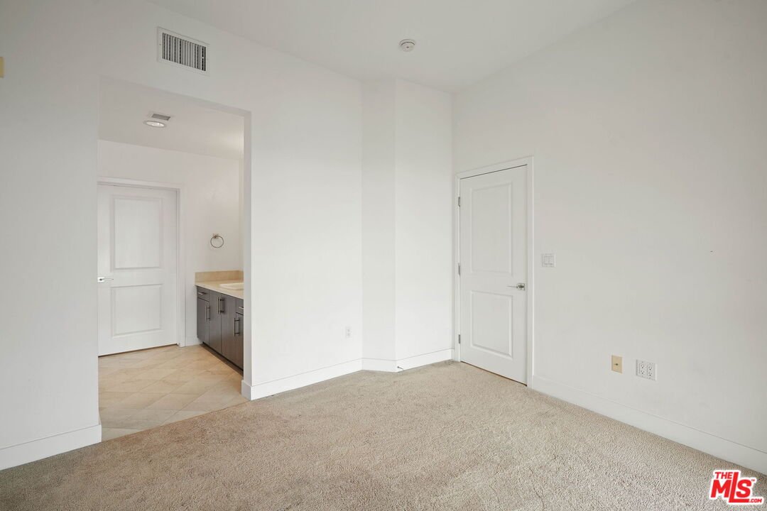 402 Rockefeller, Unit 406 Irvine, CA 92612 - Photo 19 of 33 a view of an empty room