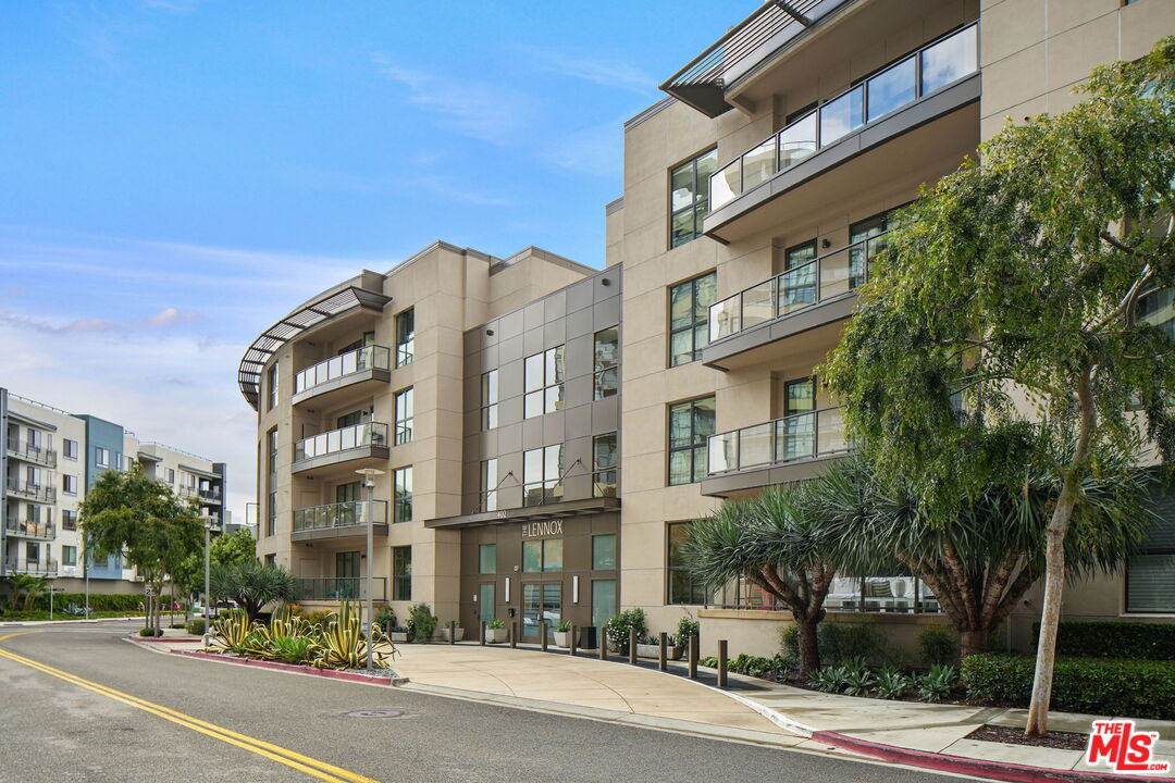 402 Rockefeller, Unit 406 Irvine, CA 92612 - Photo 2 of 33 a view of a building and a street
