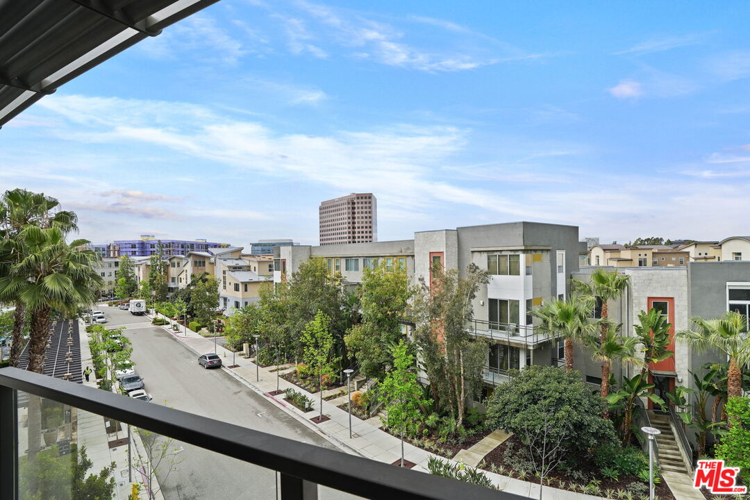 402 Rockefeller, Unit 406 Irvine, CA 92612 - Photo 27 of 33 a view of a city from a balcony