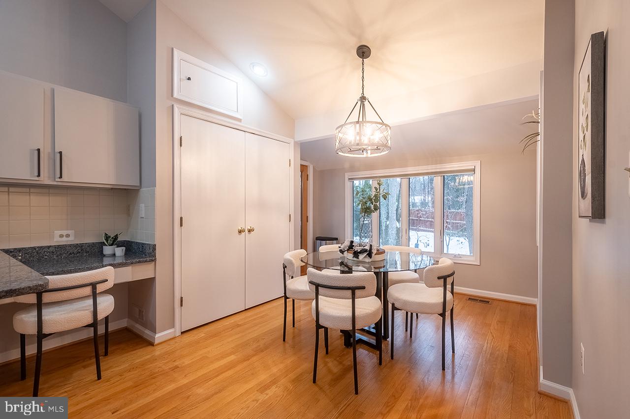 2529 Trophy Lane Reston, VA 20191 - Photo 10 of 69 a view of a dining room with furniture window and wooden floor
