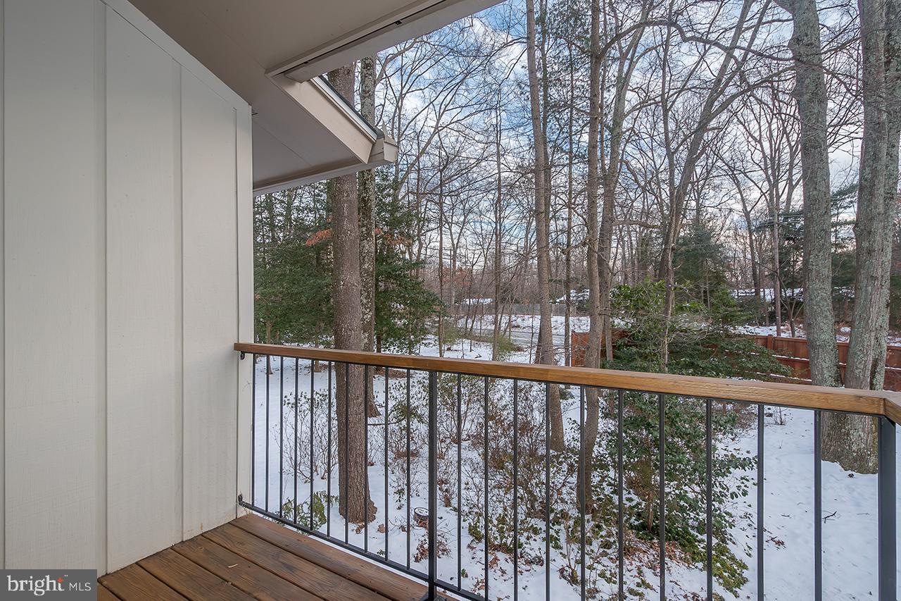 2529 Trophy Lane Reston, VA 20191 - Photo 25 of 69 a view of a wooden fence and trees