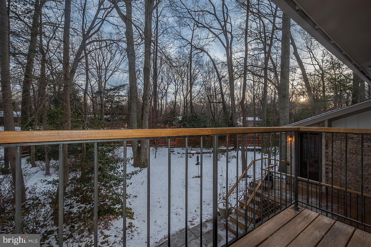 2529 Trophy Lane Reston, VA 20191 - Photo 26 of 69 a view of a balcony with wooden floor and fence