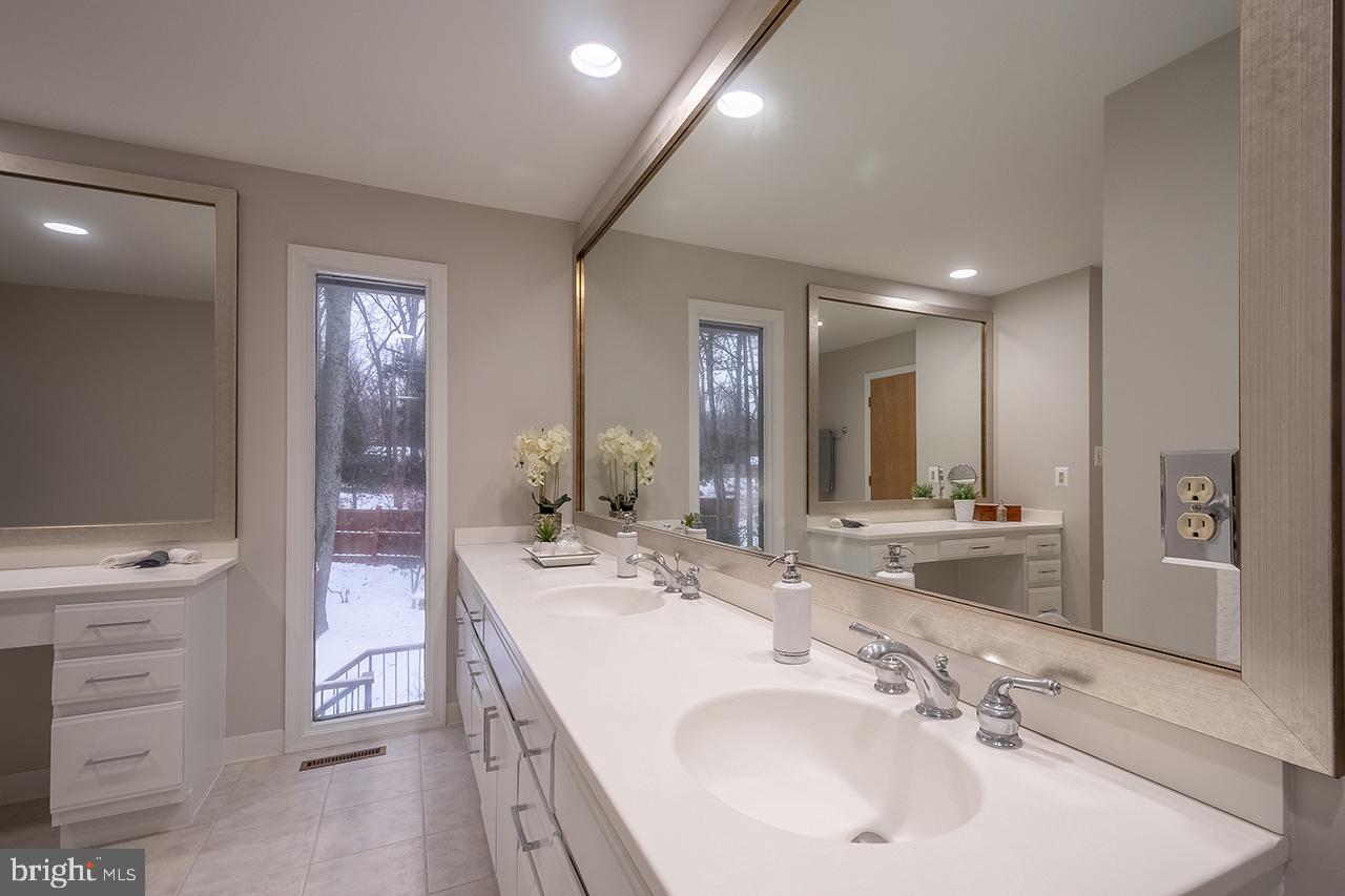 2529 Trophy Lane Reston, VA 20191 - Photo 29 of 69 a bathroom with a double vanity sink mirror and double