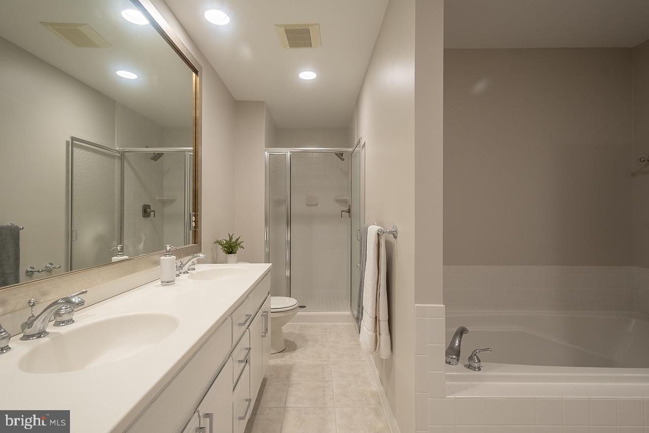 2529 Trophy Lane Reston, VA 20191 - Photo 30 of 69 a bathroom with a bathtub and a sink