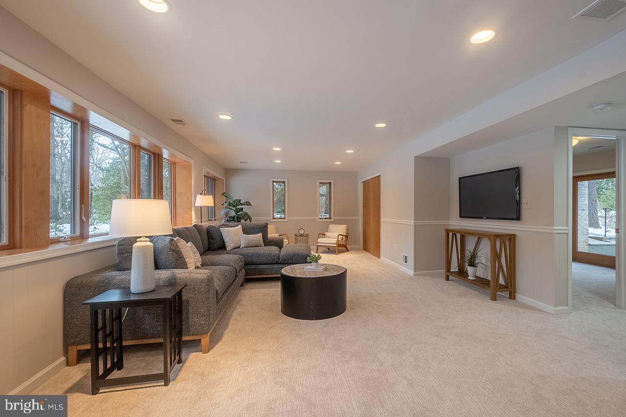 2529 Trophy Lane Reston, VA 20191 - Photo 38 of 69 a living room with furniture and a flat screen tv