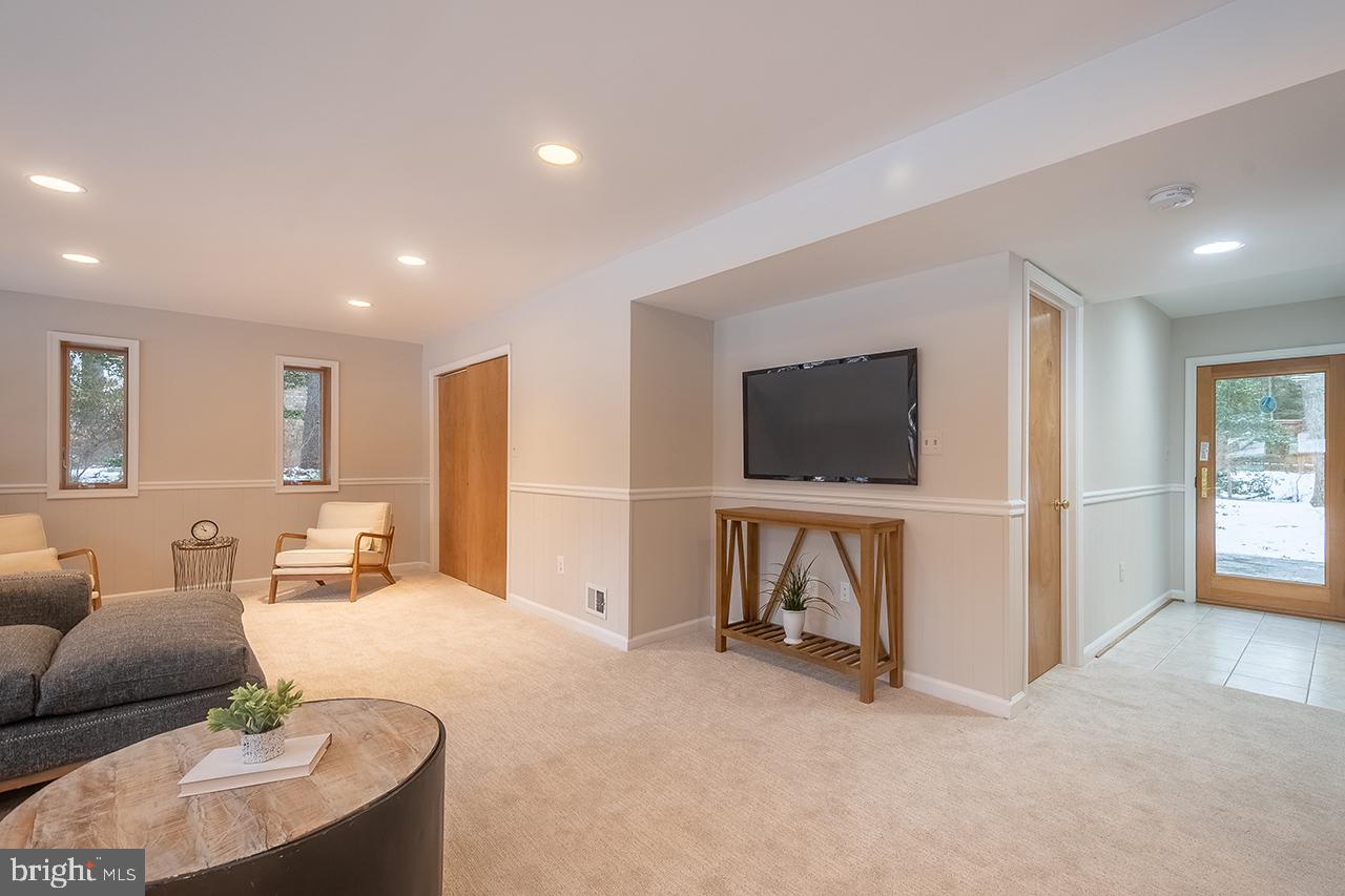 2529 Trophy Lane Reston, VA 20191 - Photo 40 of 69 a living room with furniture and a flat screen tv