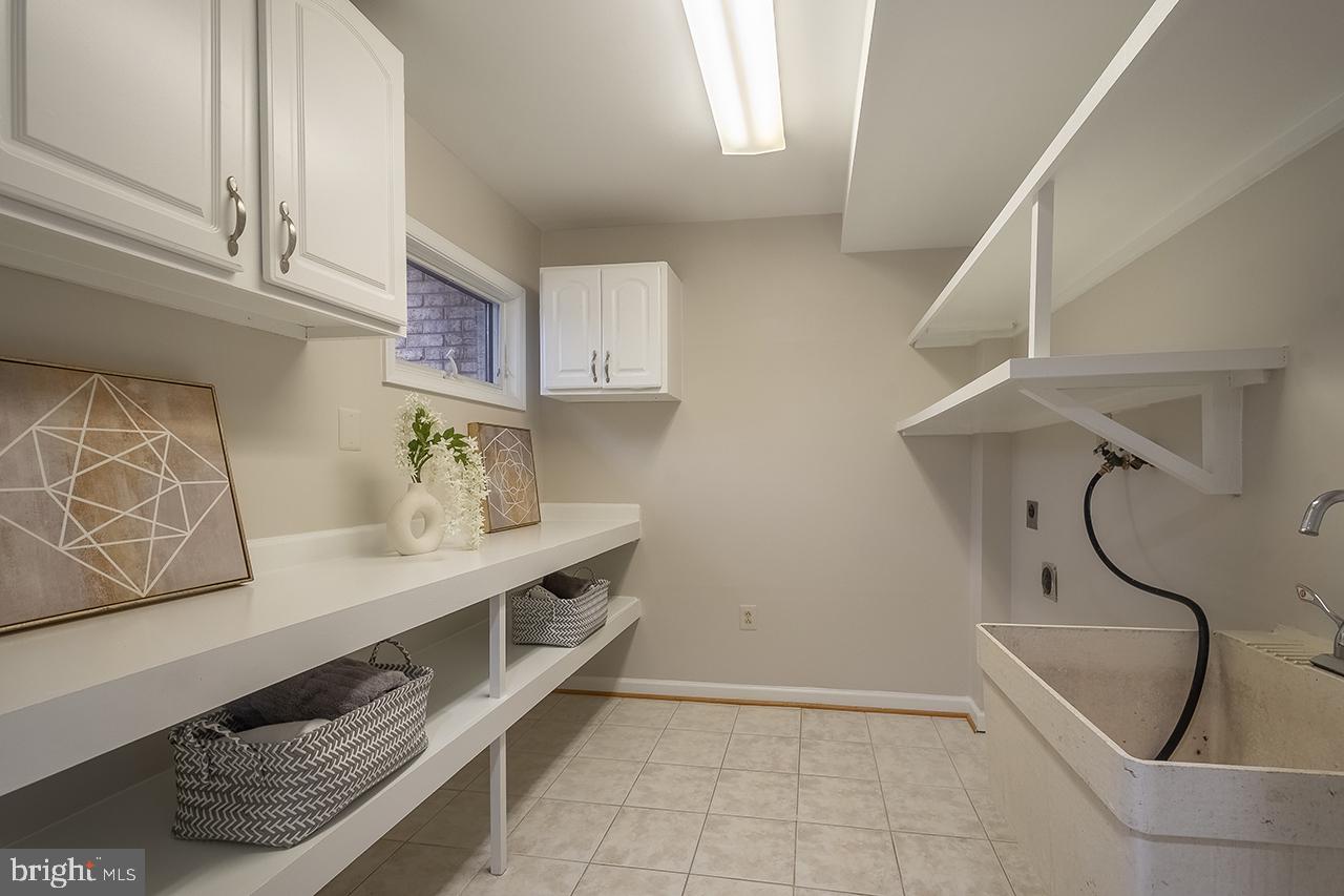 2529 Trophy Lane Reston, VA 20191 - Photo 45 of 69 It's a big Laundry room with extra workspace!