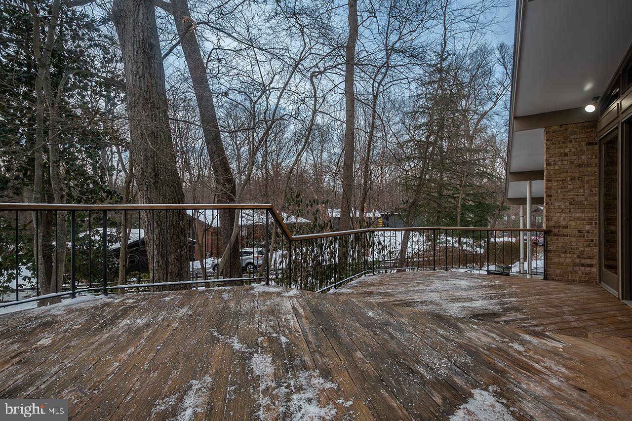 2529 Trophy Lane Reston, VA 20191 - Photo 50 of 69 a view of deck with wooden fence and trees