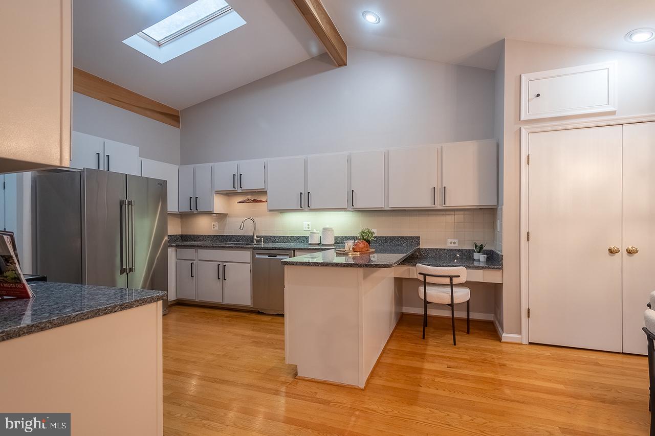 2529 Trophy Lane Reston, VA 20191 - Photo 7 of 69 a kitchen with stainless steel appliances granite countertop a refrigerator sink and stove