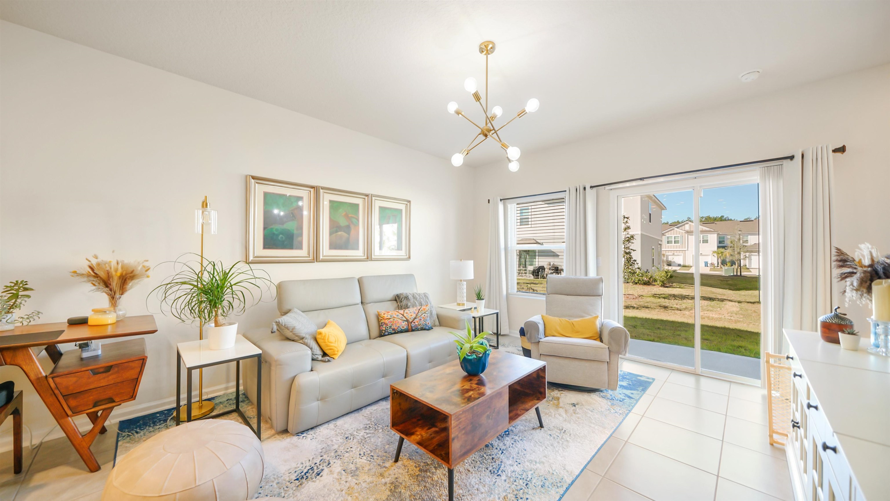 87 Ember Street St. Augustine, FL 32092 - Photo 4 of 28 a living room with furniture and a large window