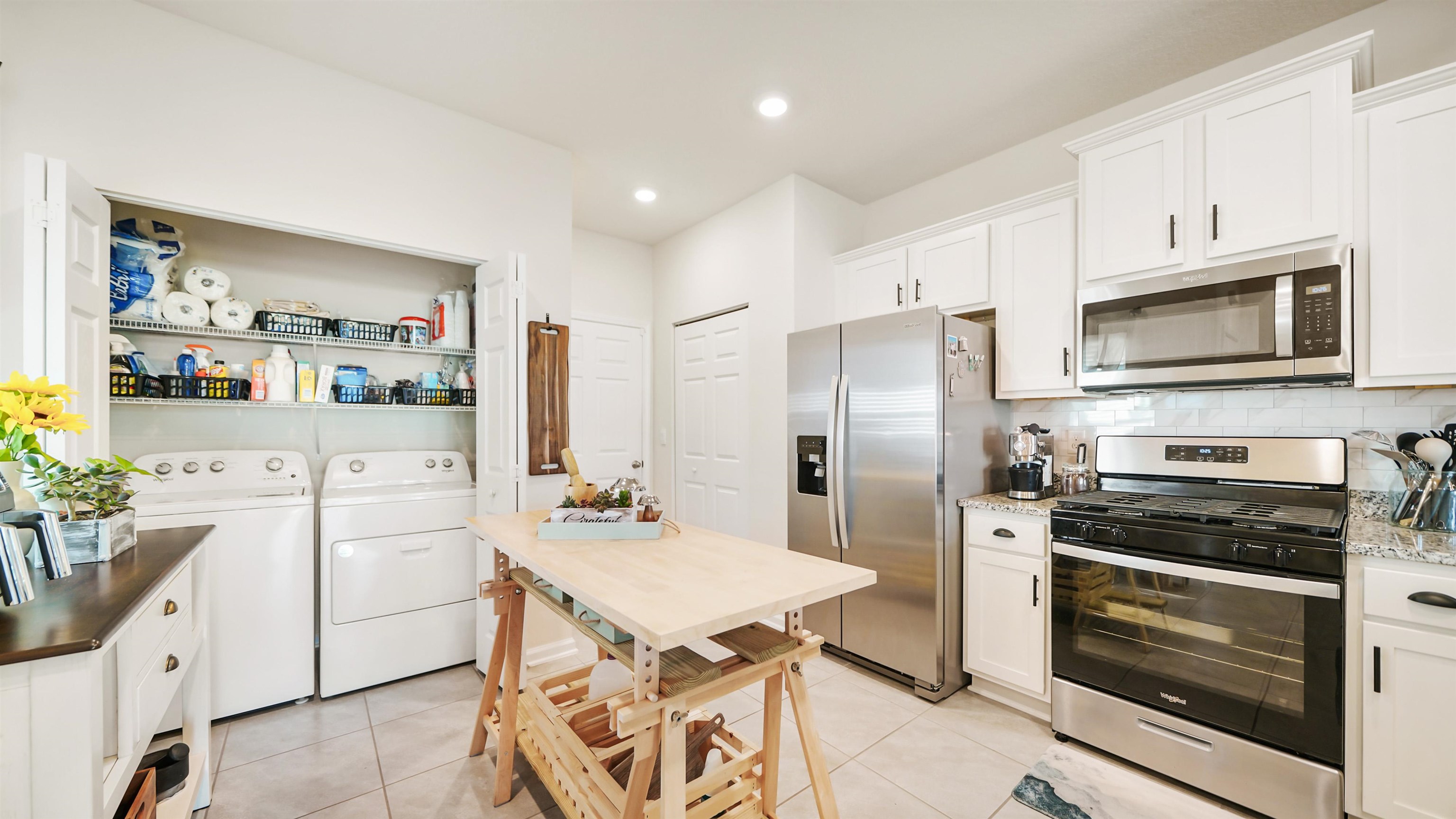 87 Ember Street St. Augustine, FL 32092 - Photo 8 of 28 a kitchen with a sink stove and refrigerator