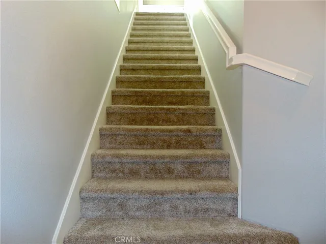 a view of cabinets and window
