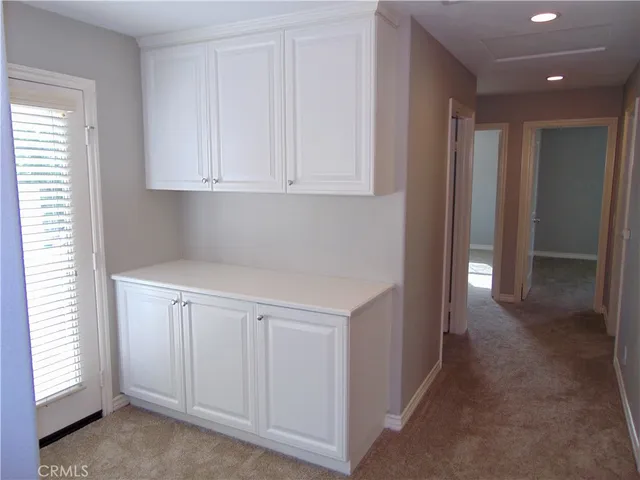 a bathroom with a sink double vanity and a mirror