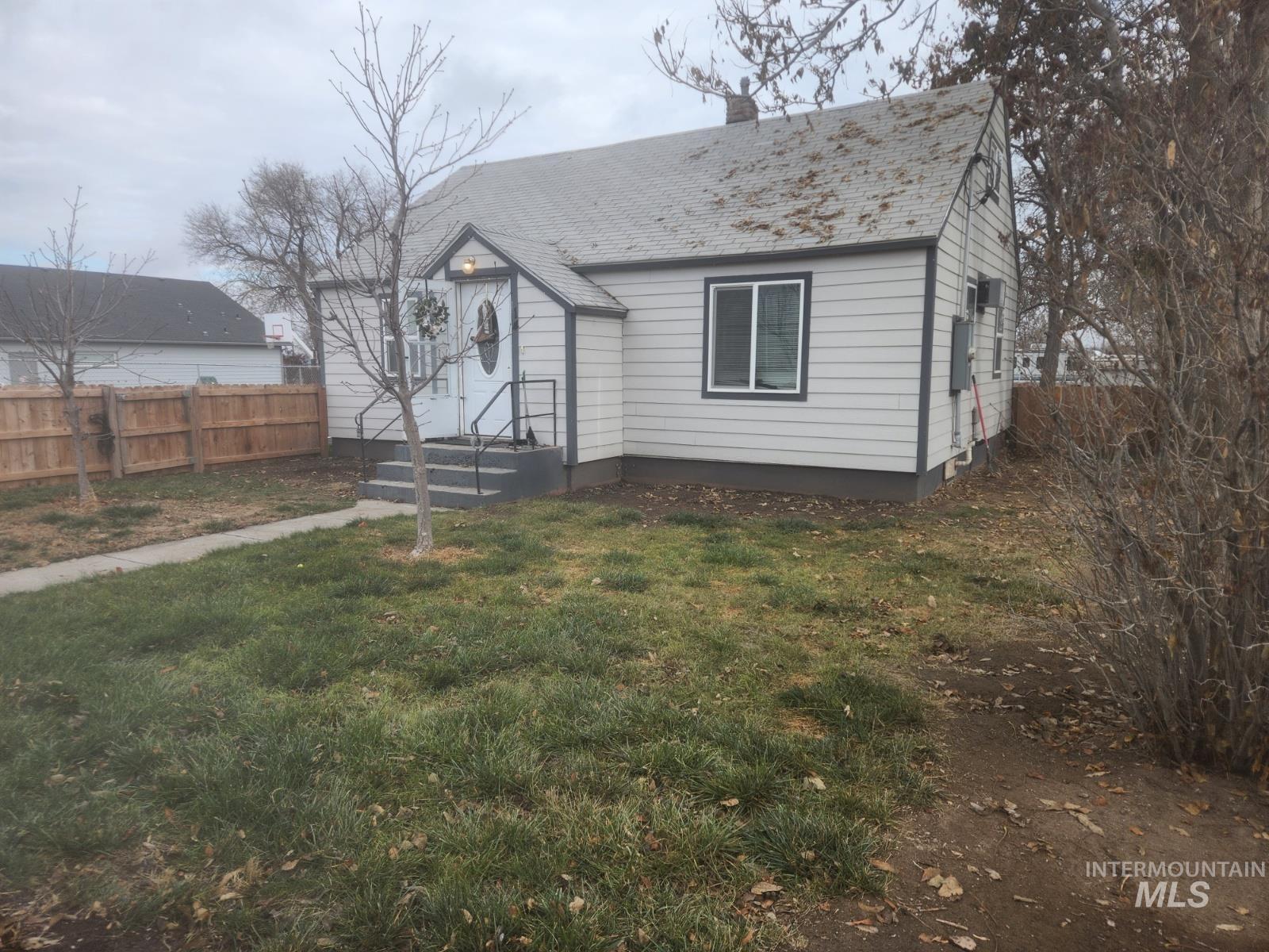 514 North 11th Street Nyssa, OR 97913 - Photo 29 of 33 View of front of property featuring a chimney and roof with shingles