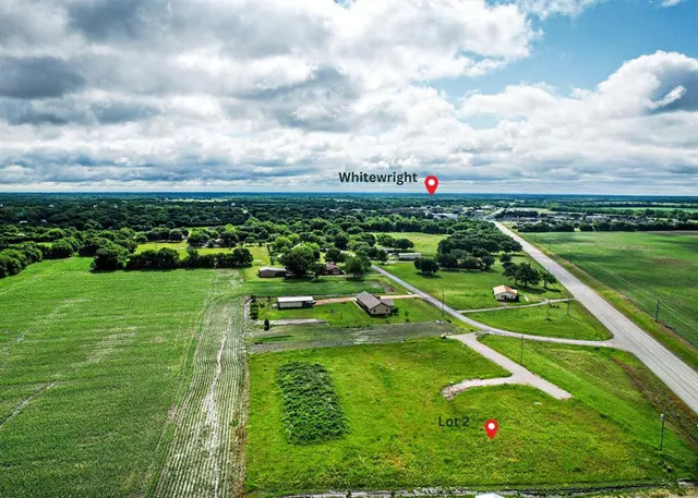 a view of a golf course with a lake