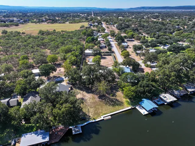 a view of a swimming pool with a lake view