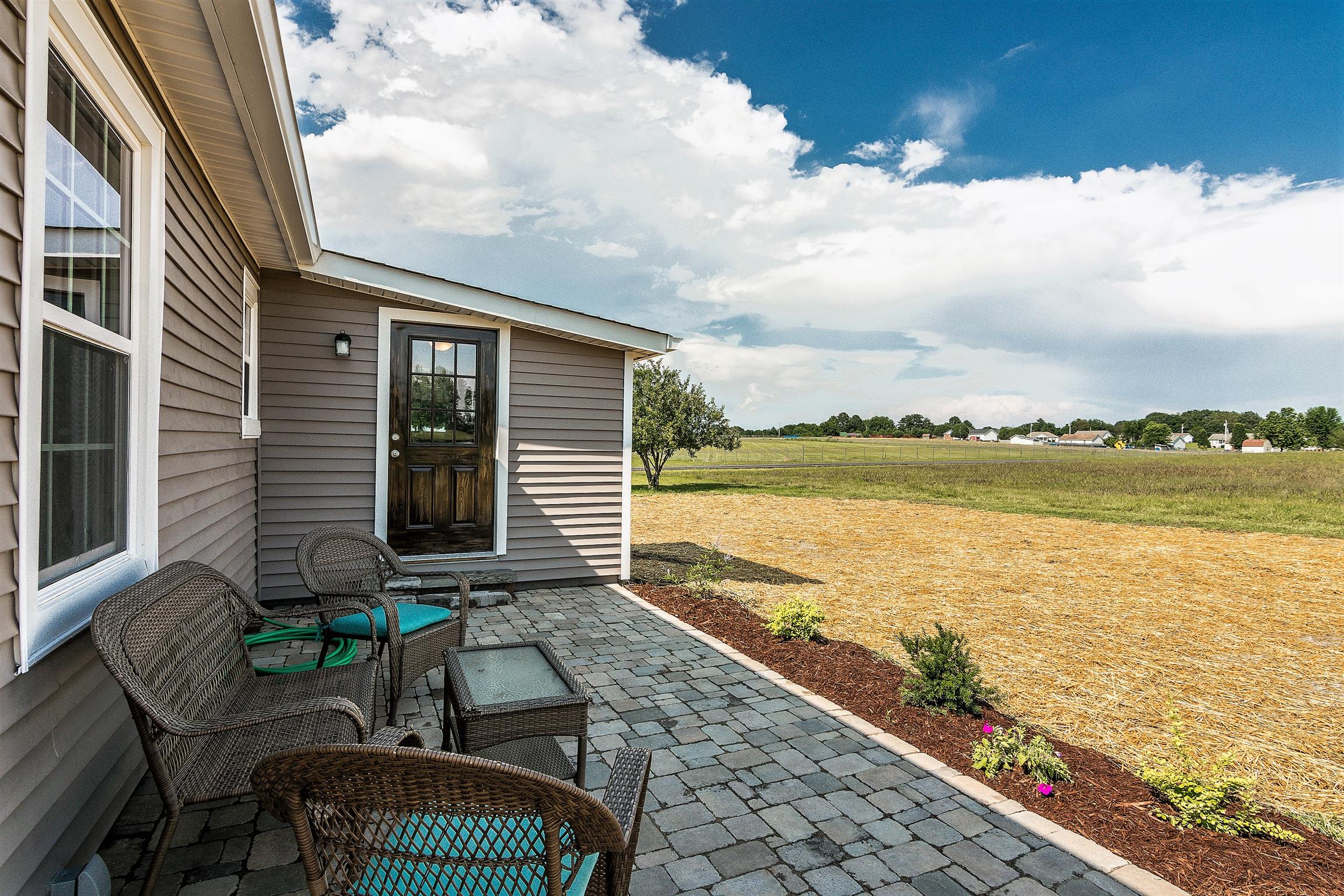 319 Airport Road Portland, TN 37148 - Photo 28 of 29 a view of a chair and table on the terrace