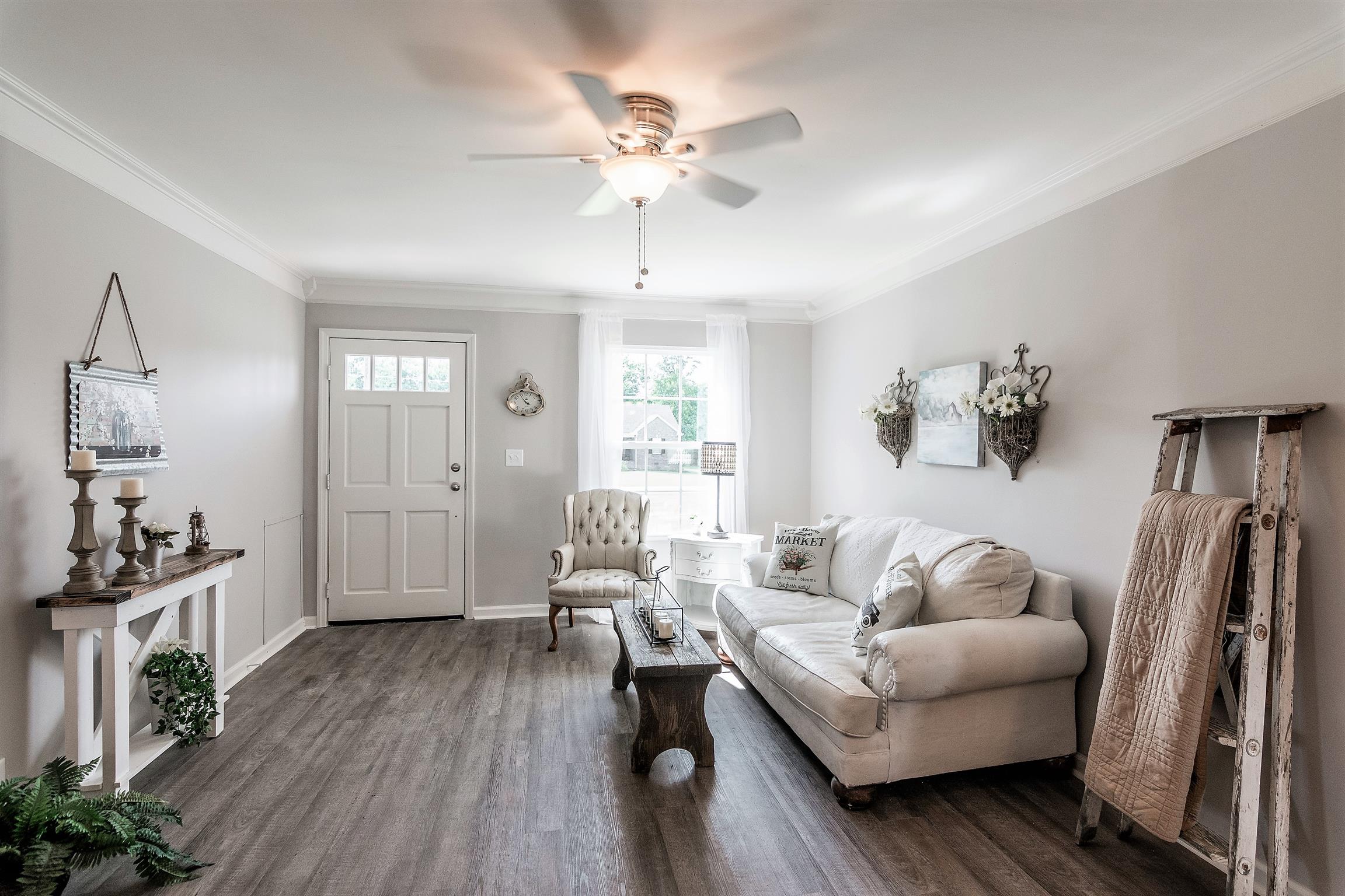 319 Airport Road Portland, TN 37148 - Photo 6 of 29 a living room with furniture and a large window