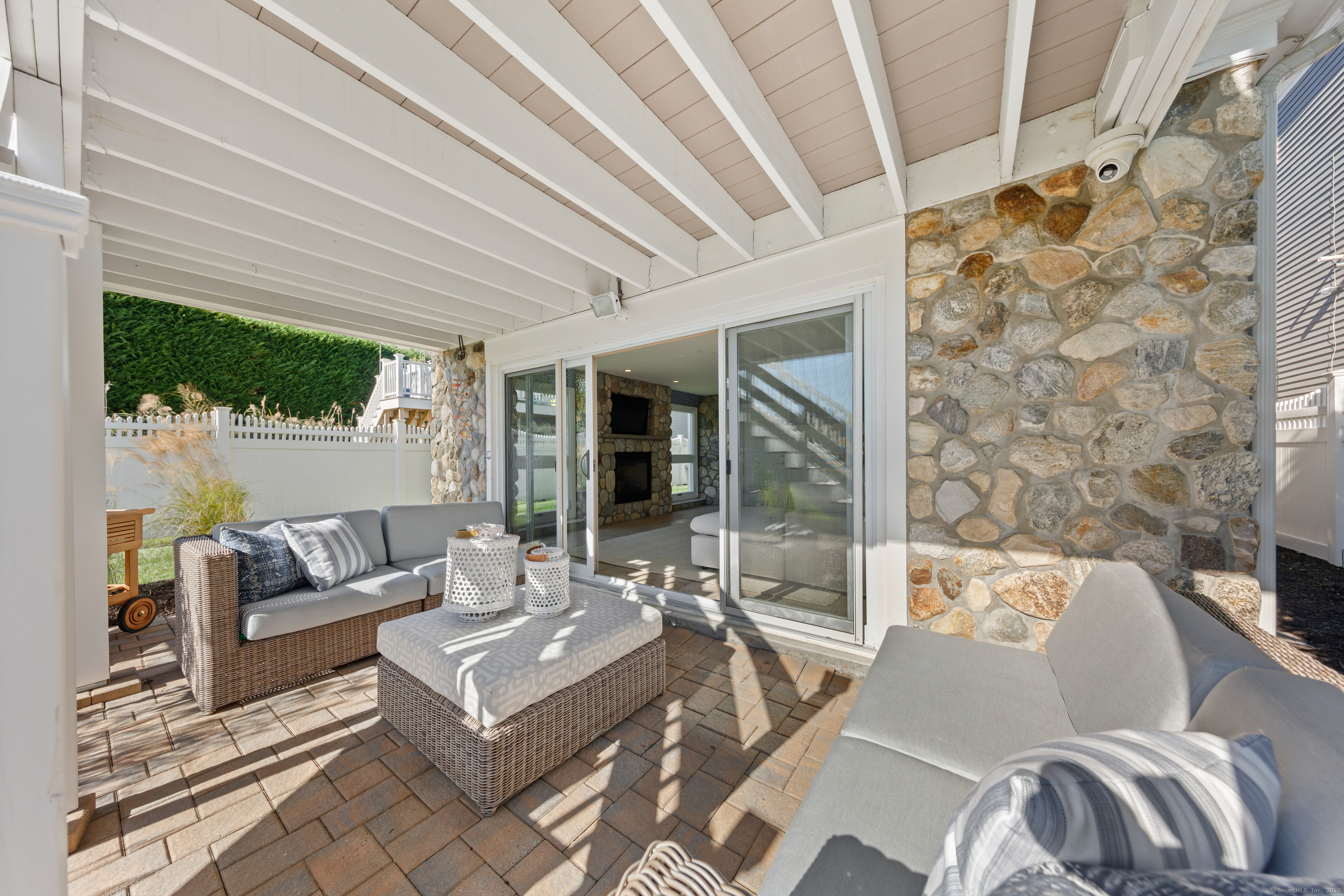 748 Rowland Road Fairfield, CT 06824 - Photo 27 of 38 a living room with furniture and a large window