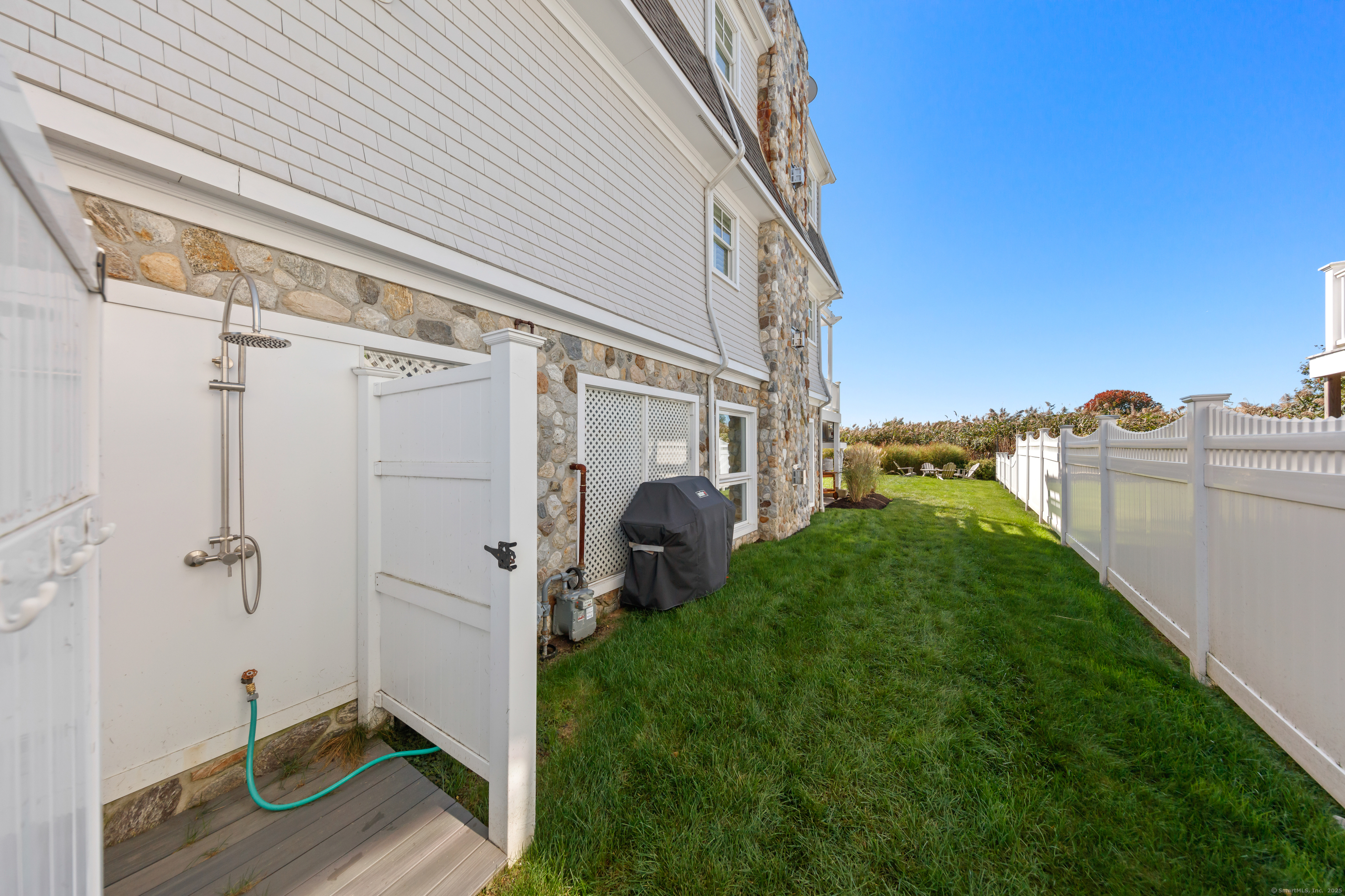 748 Rowland Road Fairfield, CT 06824 - Photo 31 of 38 a view of a back yard