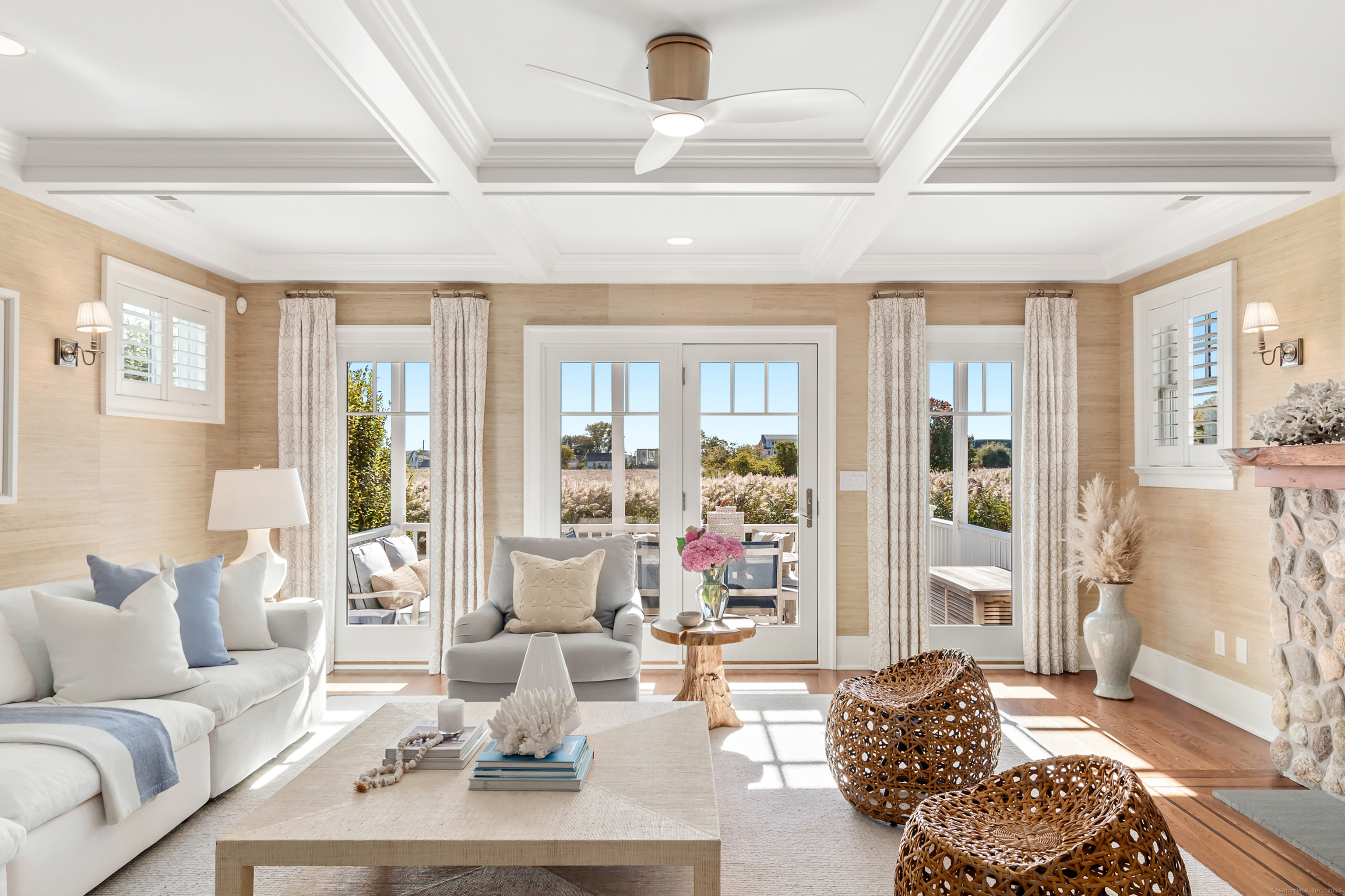 748 Rowland Road Fairfield, CT 06824 - Photo 5 of 38 a living room with furniture and a large window