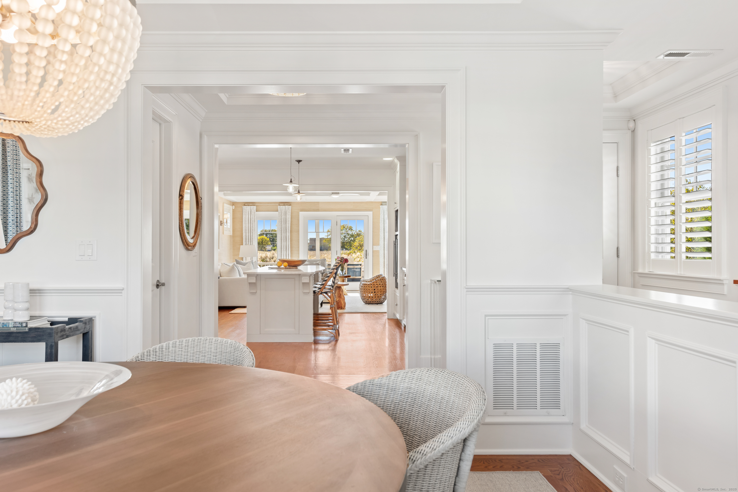 748 Rowland Road Fairfield, CT 06824 - Photo 9 of 38 a large bedroom with a bed and a table in it