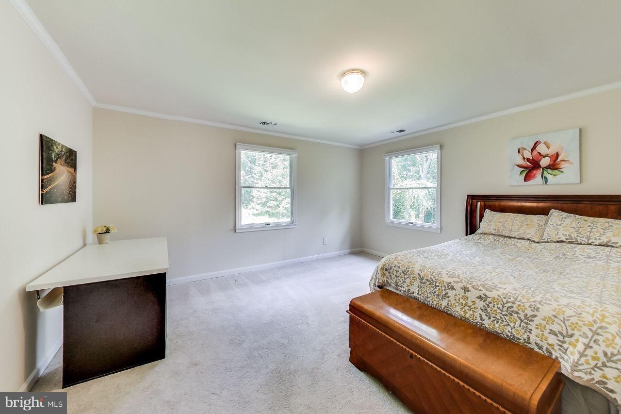 8301 Edgewood Church Road Frederick, MD 21702 - Photo 22 of 30 a bedroom with a bed and a window